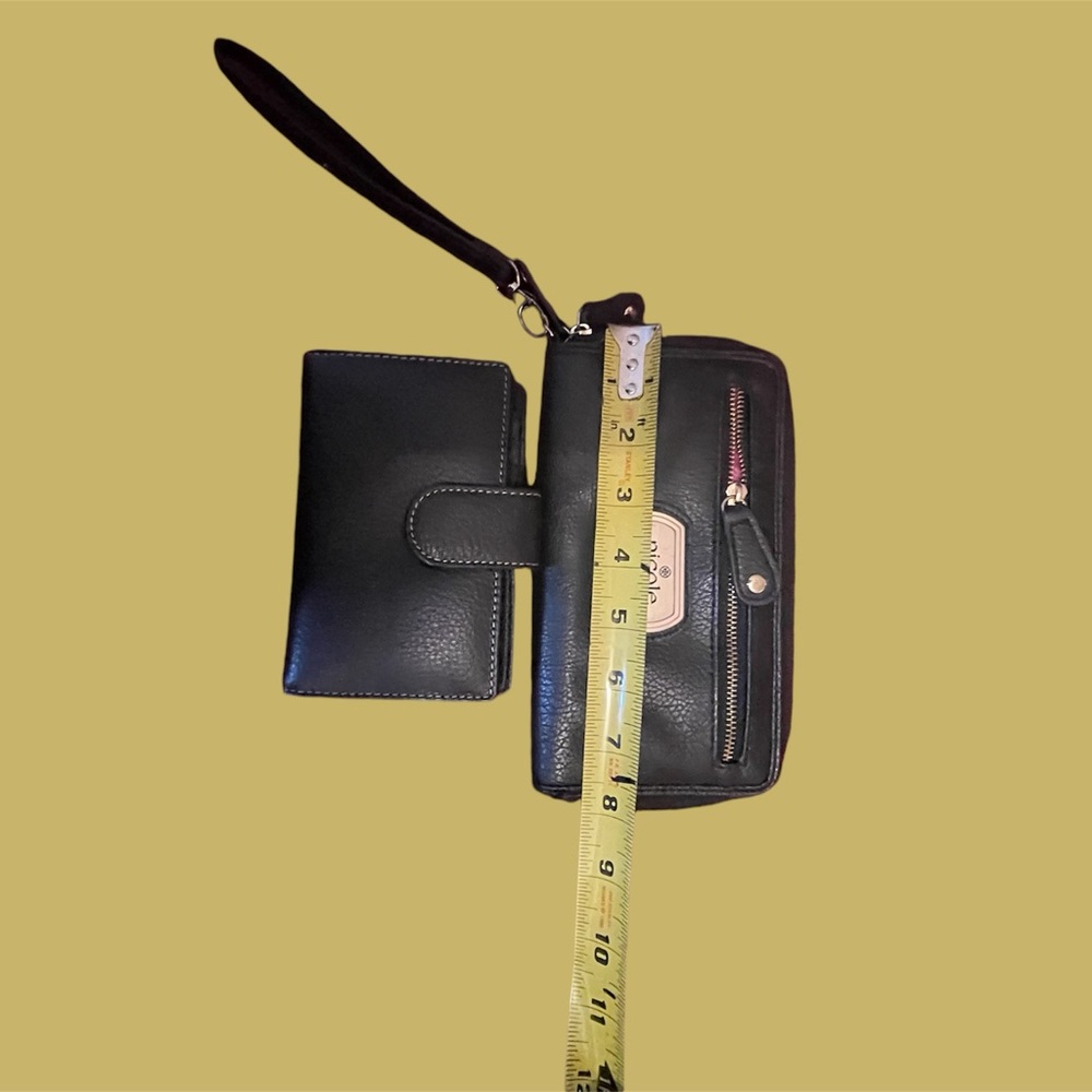 Two black wallets one new one like new